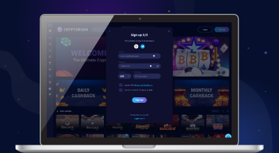 A laptop displays a CRYPTORUSH website with a pop-up Sign up form, showing fields for email, password, and various login options, against a dark blue, starry background.
