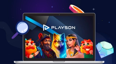 A laptop shows games of Playson with a magnifying glass, one gem and a golden chip next to it on a starry background.