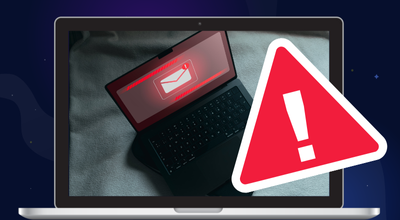 Red exclamation warning over a laptop screen showing a glowing email notification.