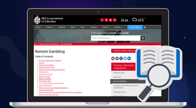 Laptop showing GGC website.