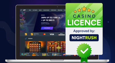 Laptop showing Jet Casino homepage, approved badge.