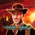 Logo for Book Of Ra Deluxe featuring a smiling explorer in a fedora at sunset.