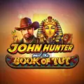 Logo for a John Hunter game featuring an explorer in a fedora against an ancient temple.