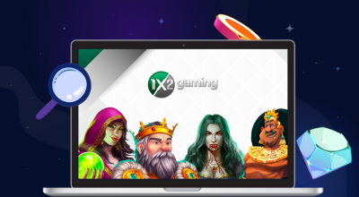 A laptop with 1x2 Gaming games, casino items around it, against a dark background.