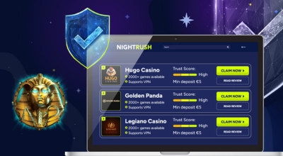 Casinos on a laptop with a shield and Coins of Egypt logo against a dark setting.