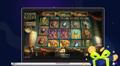 Coins of Egypt logo on a laptop with a gift box against a dark setting.