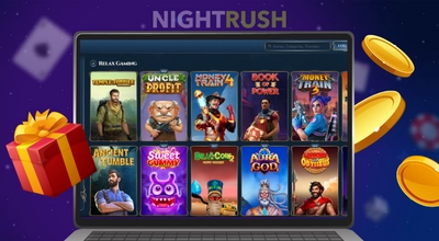 A grid of colourful online casino slot games on a laptop screen.