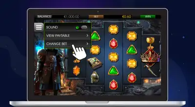 Laptop shows Fire & Steel slot gameplay & cursor on Change Bet.