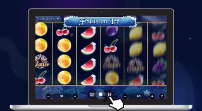 Laptop shows Fruits On Ice Slot gameplay with a cursor on the pause button.
