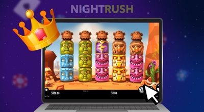 Laptop screen displaying the Turning Totems" slot game