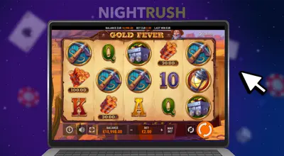 A screenshot of the Gold Fever slot game playing on a laptop.