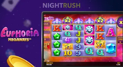 Tablet showing Euphoria Megaways slot gameplay with colorful gems and multiplier symbols.