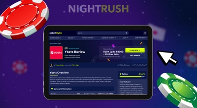 A tablet displays an online review of Ybets Casino featuring a welcome bonus offer.