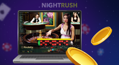 Live dealer roulette game streamed on a laptop screen.