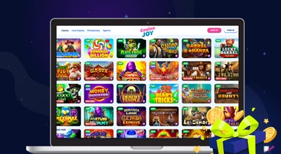 Casino Joy desktop lobby showing various slot games with a blue and yellow gift box.