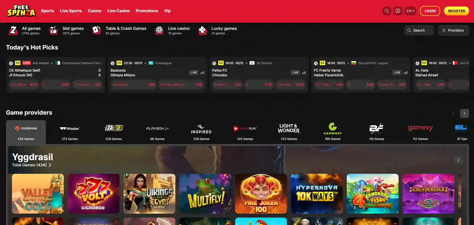 FreeSpinza Casino's main page with hot picks, game providers, and a menu against a black background.