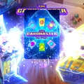 The text THE CARDMASTER is displayed on a glowing trading card surrounded by bright light effects.