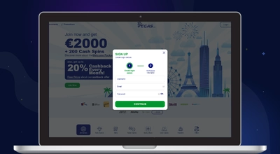 Laptop shows BluVegas registration form.