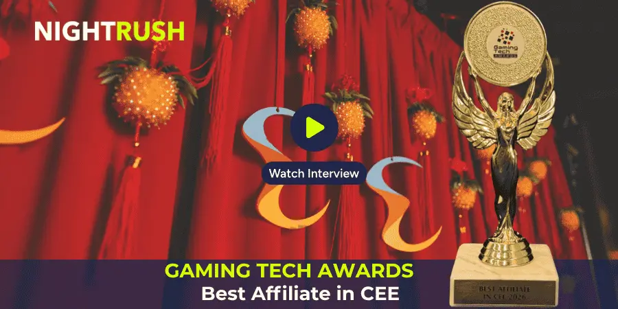 Nightrush wins Best Affiliate in CEE 2026 at the Gaming Tech Awards, proudly showcasing the trophy with vibrant event background.