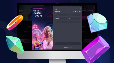 A desktop monitor showing a Spinalto Casino registration form with a welcome bonus banner.