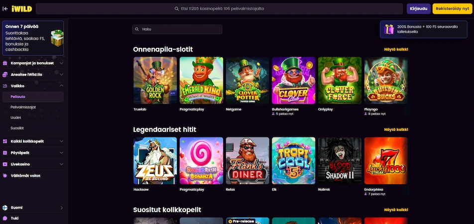iWild sivuston peliaulanäkymä, vasemmalla iWild logo ja oikeassa yläkulmassa Kirjaudu ja Rekisteröidy nyt valikot, keskellä Onnenapila-slotit ja pelien kuvakkeita.