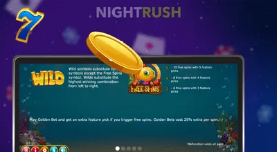 En laptop med Golden Fish Tank på skjermen, rundt en syver og en gullmynt.